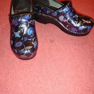 Dansko Black and Blue Floral Clogs